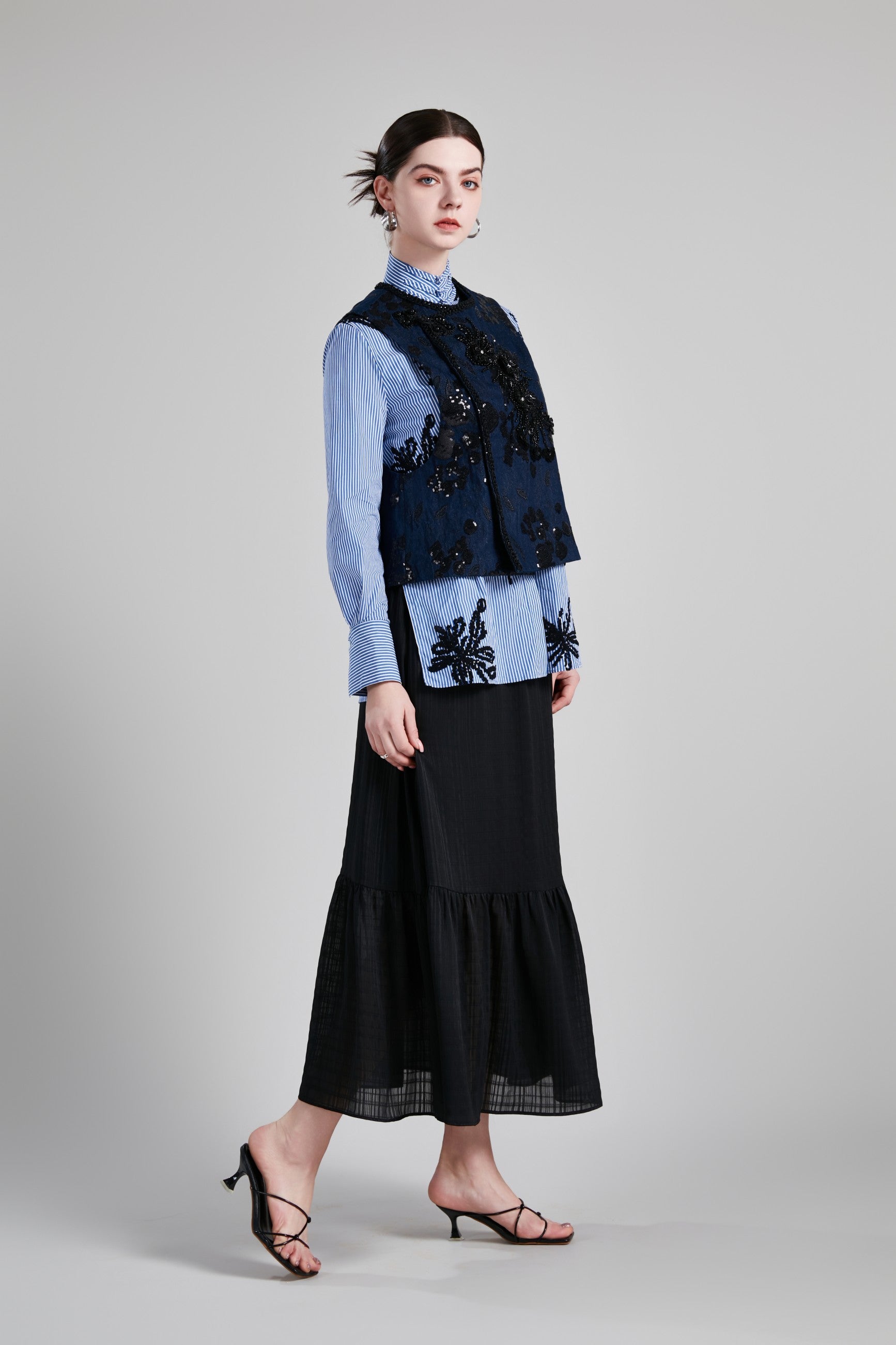 ROUND NECK ASYMMETRICAL VEST